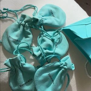 Five Tiffany & Co pouches and gift bag